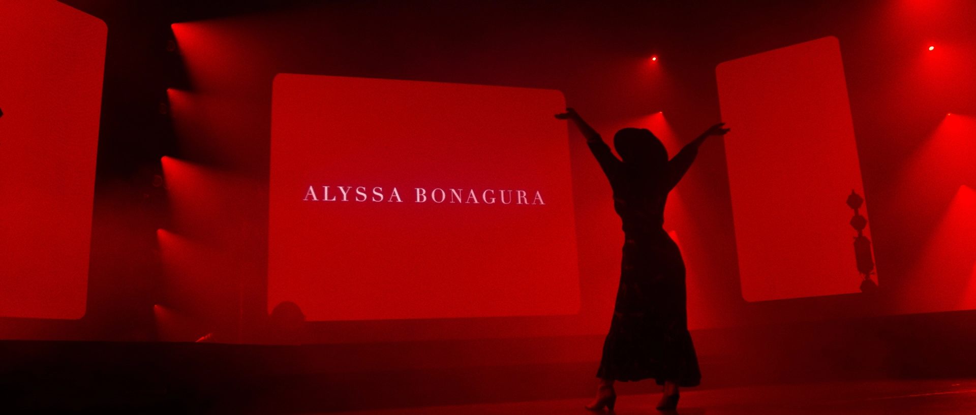 Alyssa Bonagura on stage during live performance.